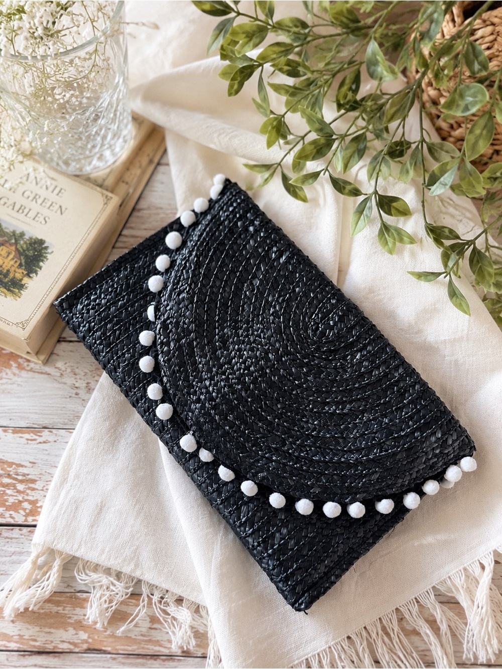 Shiraleah Navy Woven Straw Clutch with White Pom-Pom Trim